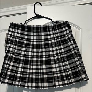 Brand New black and white tennis skirt with no stretch.